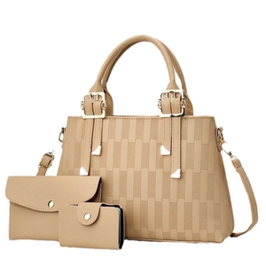Three-piece beige faux leather tote bag set with woven texture and gold hardware