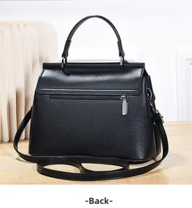 Back view of black pebble leather handbag featuring a secure zipper pocket and hardware