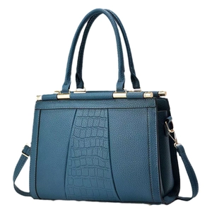Navy blue women's tote bag with mixed leather textures and golden hardware
