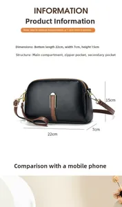 Zwarte crossbodytas van generfd leer met afmetingen 22x7x15cm en interne vakindeling getoond