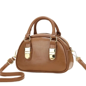 Brown retro PU leather mini handbag with gold buckles and detachable shoulder strap