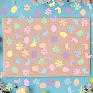 Easter bunny and egg confetti in pastel colors for party table decoration and DIY crafts