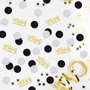 New Year party table confetti set with gold Hello 2023 cutouts and shiny stars