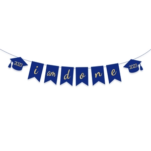 Navy blue and gold glitter i am done graduation banner with 2023 grad cap accents