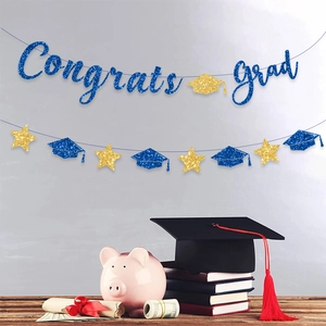 Blue and gold Congrats Grad banner with glitter stars and graduation caps decoration