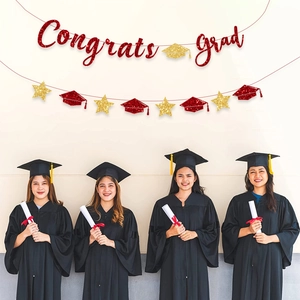 Red glitter Congrats Grad banner with gold mortarboard and stars for party decor