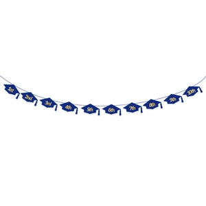 Detail of graduation banner with navy blue paper doctoral caps and gold glitter numbers