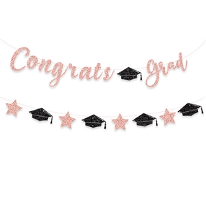Congrats Grad glitter banner with rose gold letters and black graduation cap decorations