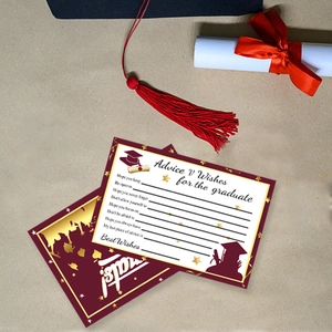 Flat lay of graduation advice cards with burgundy tassels and academic elements
