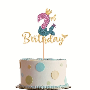 Detail of 2nd birthday mermaid cake topper with glitter crown and turquoise tail