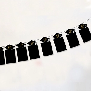 Black graduation photo banner with gold 6th-12th grade glitter caps for party decor