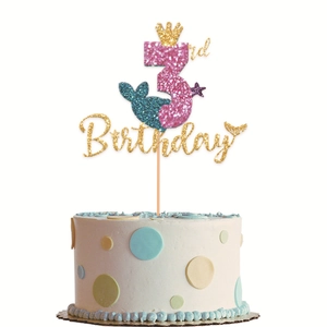 Detailed view of glitter 3rd Birthday mermaid cake topper with crown and starfish