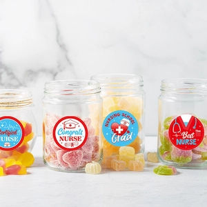 Adhesive graduation nurse stickers on glass jars with medical icons and nursing school text