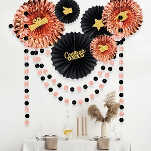 Rose gold and black Congrats Grad graduation party paper fans and hanging decorations