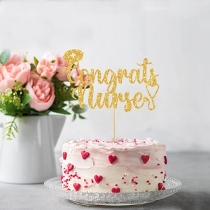 Glittery gold Congrats Nurse cake topper with stethoscope and cap for graduation party