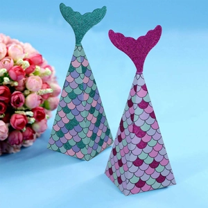 Mermaid tail gift boxes with shimmering glitter decor for weddings and parties