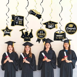 Black and gold graduation party swirls with 2026 cap and scroll hanging decorations