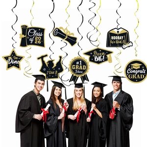 Black and gold graduation party decorations featuring spirals and diploma card hangers