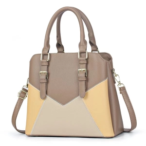 Detailed view of the V-shape patchwork faux leather handbag with golden buckle accents