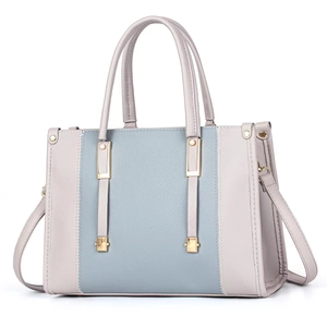Elegant grey-blue and pink contrast leather handbag with gold hardware and detachable strap
