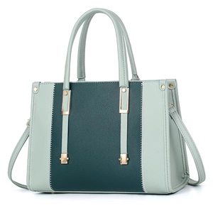 Detail of green bicolor tote bag with lychee texture and wave stitching accents
