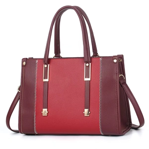 Elegant red contrast tote bag in pebbled faux leather with gold metal trim and long strap