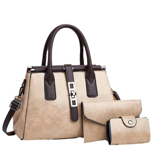 Three-piece women's tote set including a large beige shoulder bag and matching pouches