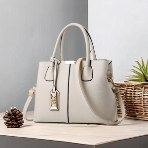 Minimalist ivory large capacity tote bag with lychee grain leather and gold hardware