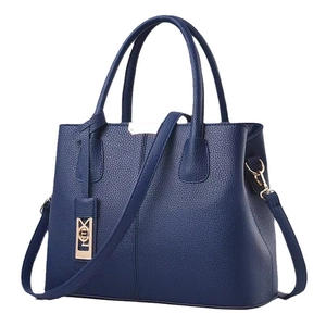 Navy blue lychee pattern tote bag with gold hardware shown from a 45-degree angle