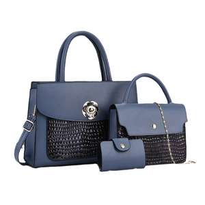 Three-piece hazy blue tote bag set with crocodile texture and metallic flower detail