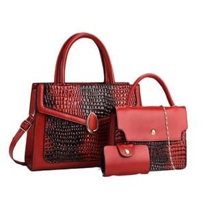 Red 3-piece tote bag set with crocodile texture and gold hardware detailing