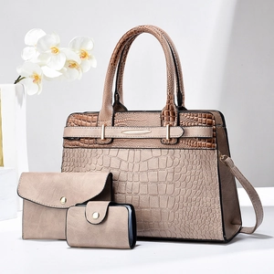 Three-piece beige faux crocodile tote bag set with matching envelope clutch and card holder