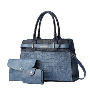 Three-piece set of crocodile embossed tote bag, envelope clutch, and card holder
