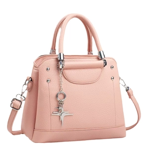 Pink lychee texture leather handbag with star pendant and silver hardware accessories