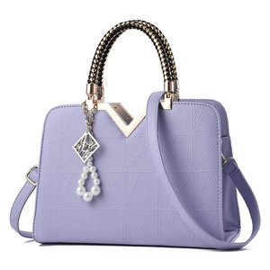 Light purple structured handbag with geometric embossing and braided handles