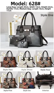 Three-piece tote bag set with a multi-layered zipper interior and geometric color blocking