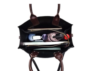 Interior view showing multiple compartments and large capacity of the leather tote bag