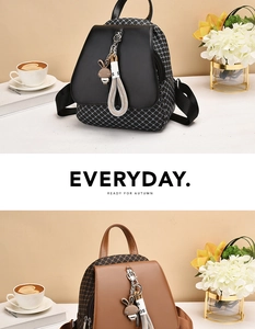 Detail of plaid PU leather mini backpacks with cute rabbit charm and weaving strap