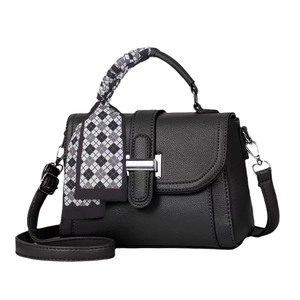 Fashionable black pebbled leather square handbag with silver H buckle and silk scarf handle