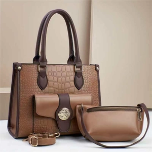 Three-piece brown tote bag set with crocodile pattern and golden metal logo detail
