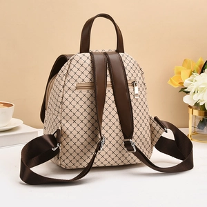 Minimalist beige backpack with black grid pattern and brown leather straps for women