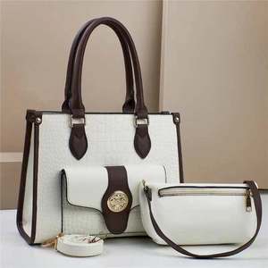 Three-piece tote bag set with crocodile pattern finish and vintage gold emblem