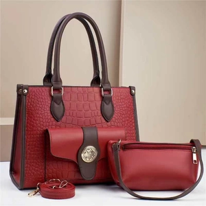 Burgundy crocodile embossed tote bag set with golden logo for daily office use