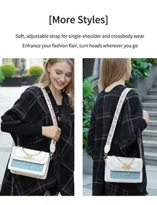Détail de la bandoulière brodée réglable et chaîne dorée sur le sac à carreaux élégant