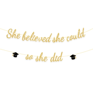 She Believed She Could So She Did graduation banner with gold glitter and black caps