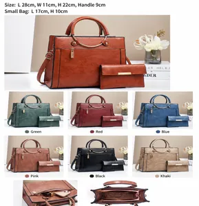 Close-up of premium PU leather tote with gold ring handles and internal pocket structure