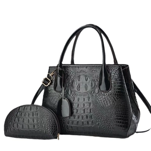 Large black crocodile pattern handbag set with crossbody strap and matching coin purse
