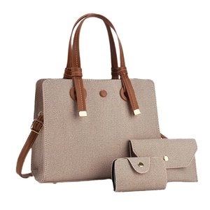 Three-piece women's beige and brown woven tote bag set with matching clutches