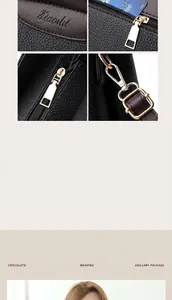 Detail van zwarte leren handtas met gouden hardware en interne kaartsleuf ontwerp