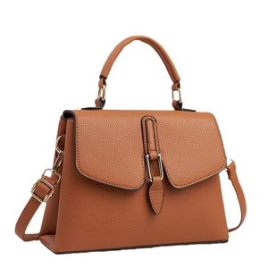 Brown litchi grain crossbody bag with gold hardware and top handle shown at 45-degree angle